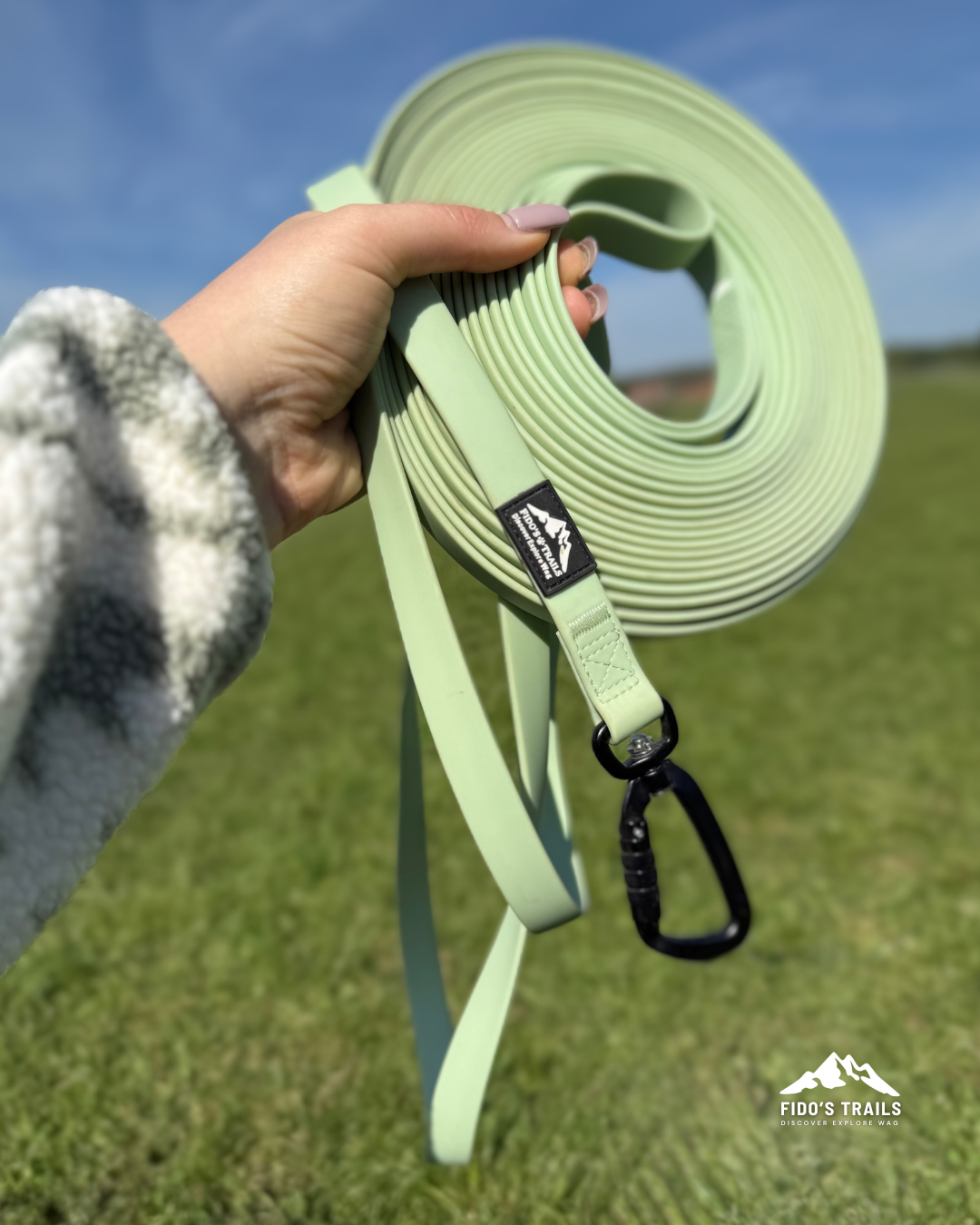 10m dog long line lead held in hand, designed for control and comfortable handling outdoors